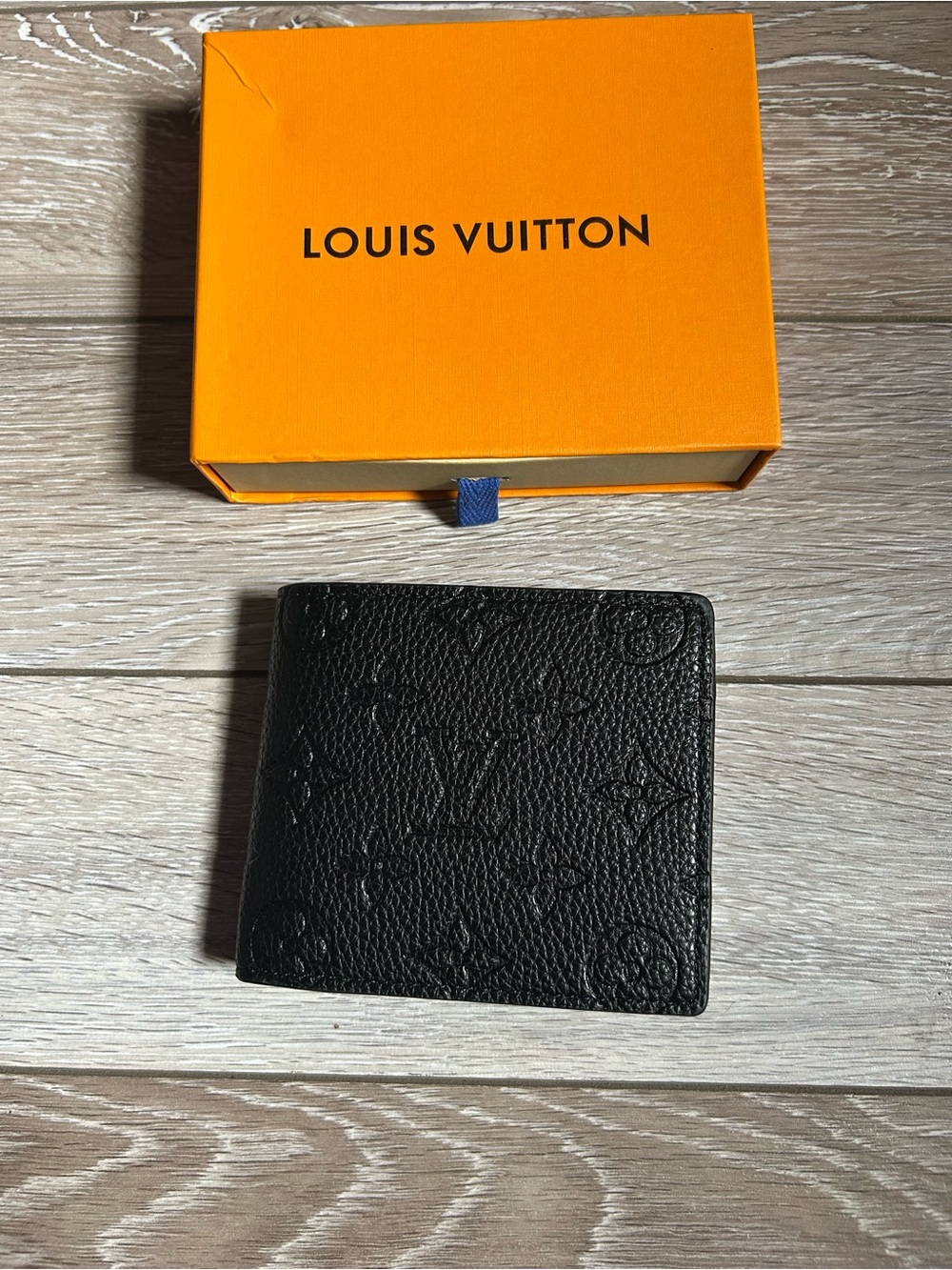 Men’s Louis Vuitton Men's Black Embossed Monogram Bi-Fold Wallet